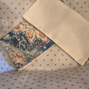 Two lightweight burlap matching pillowcases.